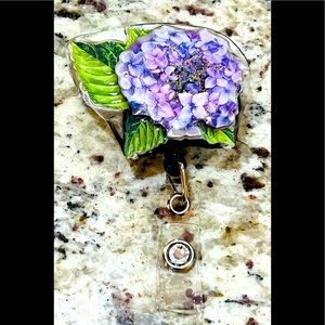Purple and diamond flower badge reel. Badge pull.